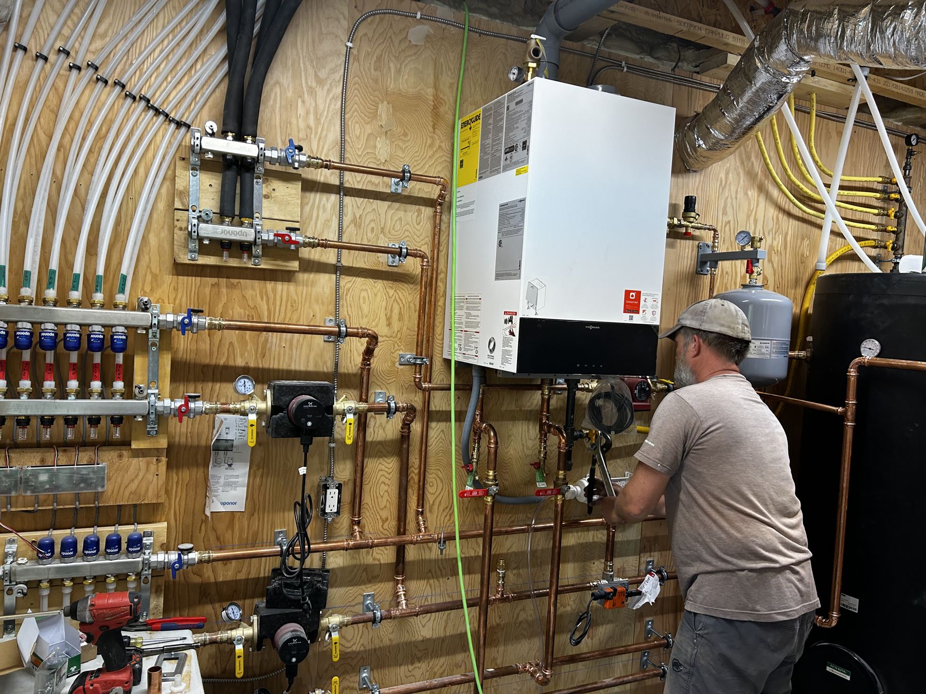 A-3 technician at a mechanical wall